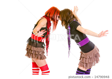Two cheerful young girlfriends abuting foreheads. Two cheerful young girlfriends abuting foreheads. 14790948
