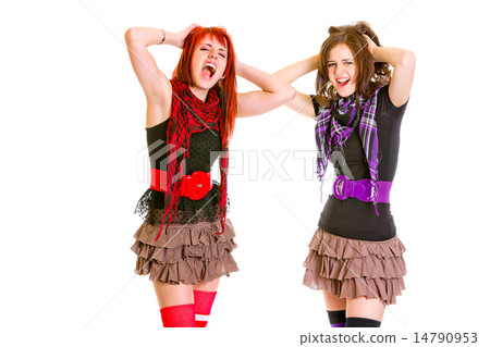 Two cute girlfriends with hands near head unhappily crying. 14790953