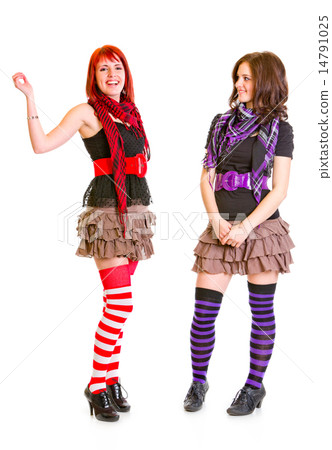 Smiling pretty teengirl looking on laughing girlfriend. 14791025
