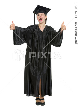 Smiling graduation woman showing thumbs up isolated Smiling graduation woman showing thumbs up isolated 14791030