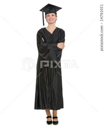 Full length portrait of woman in graduation cap and gown isolate 14791051