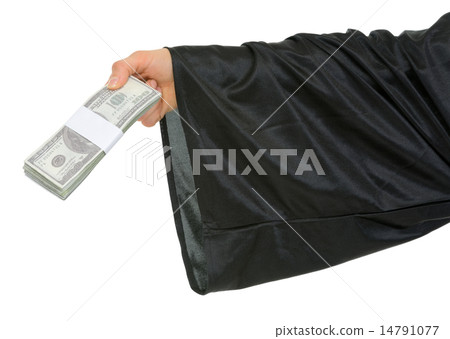Close up on hand of graduation student with pack of dollars in h 14791077