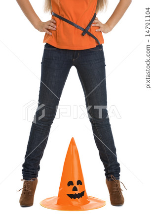 Closeup on Halloween hat between woman legs Closeup on Halloween hat between woman legs 14791104
