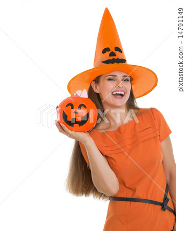 Happy woman holding Halloween bucket Happy woman holding Halloween bucket 14791149