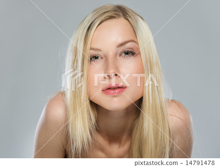 Portrait of blond hair cheeky teenage girl 14791478