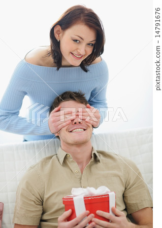 Girl making surprise to boyfriend Girl making surprise to boyfriend 14791676