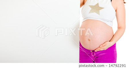Pregnant woman holding blank billboard. Close-up.. Pregnant woman holding blank billboard. Close-up.. 14792291