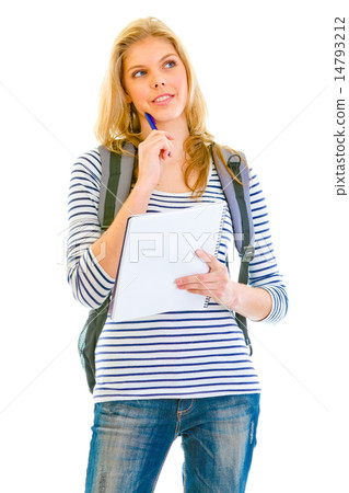 Pensive teengirl with schoolbag holding notebook and pen in hands. 14793212