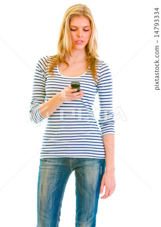 Portrait of teen girl writing sms 14793334