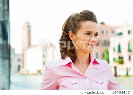 Portrait of young woman on grand canal in venice, italy 14793467