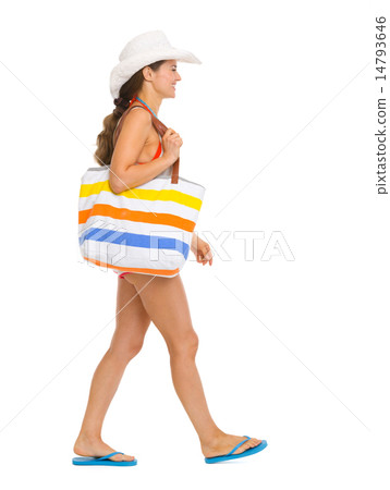 Beach young woman going sideways 14793646