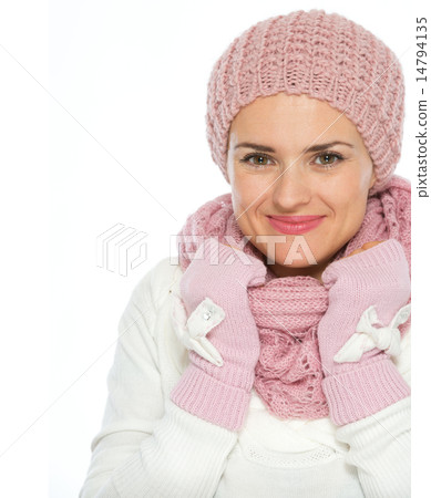 Portrait of happy woman in knit scarf, hat and mittens Portrait of happy woman in knit scarf, hat and mittens 14794135