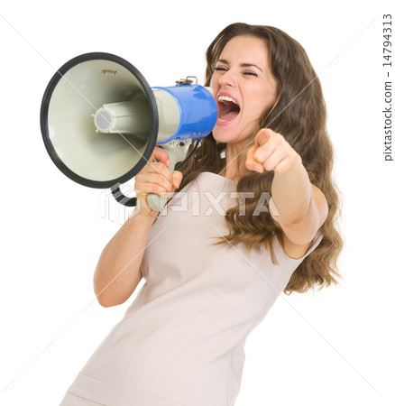 Young woman shouting in megaphone and pointing in camera Young woman shouting in megaphone and pointing in camera 14794313