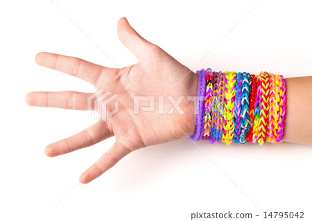 Hand with rubber rainbow loom bracelets on white 14795042