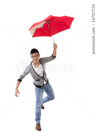 Chinese man standing under an umbrella. 14797729