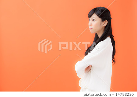Young woman suffering · orange back Young woman suffering · orange back 14798250