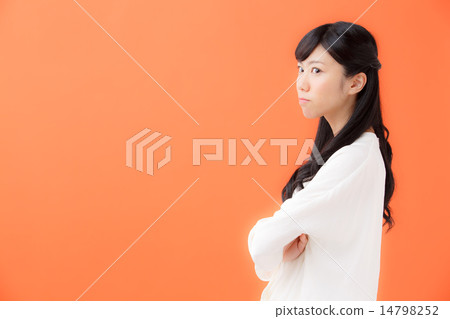 Young woman suffering · orange back Young woman suffering · orange back 14798252