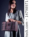 Woman with case 14798971
