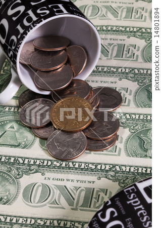 One coffee cup and US dollars One coffee cup and US dollars 14801894