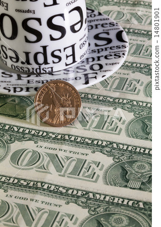 One coffee cup and US dollar One coffee cup and US dollar 14801901