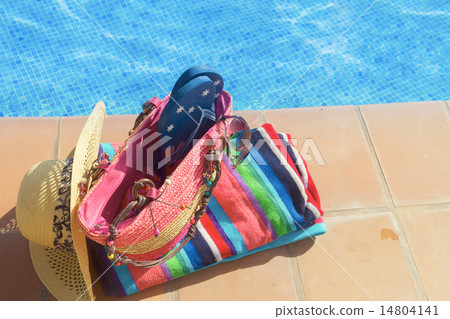 towel and bathing accessories near pool towel and bathing accessories near pool 14804141