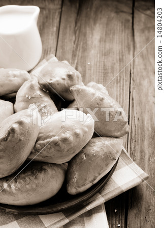 tasty pastry on plate at wood 14804203