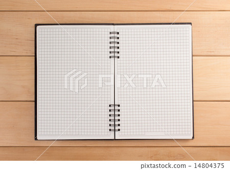 checked notebook on wood checked notebook on wood 14804375