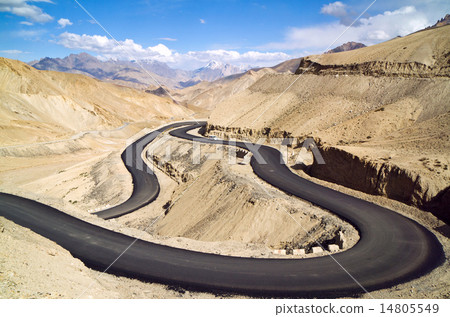 The new winding road in the Himalayas mountains The new winding road in the Himalayas mountains 14805549