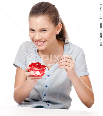 Pretty young woman eating cake. Isolated Pretty young woman eating cake. Isolated 14807603