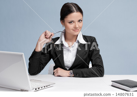 Business woman working in office place 14807631