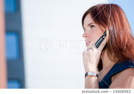 Businesswoman make call by mobile phone. 14808983