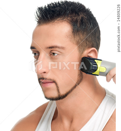 Cutting hairs of attractive man Cutting hairs of attractive man 14809226