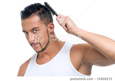 Man with perfect hair using comb brush Man with perfect hair using comb brush 14809255