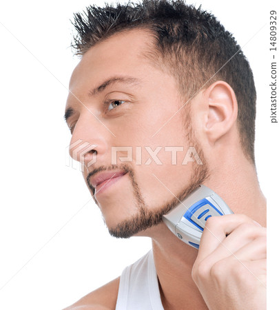 Young handsome man shaving 14809329