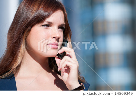 Businesswoman make call by mobile phone. 14809349