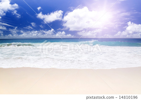 White coral sand and azure indian ocean. White coral sand and azure indian ocean. 14810196
