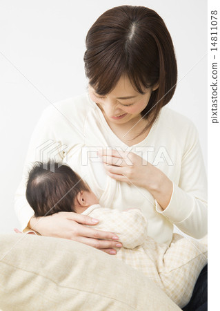 Mother holding a baby Mother holding a baby 14811078