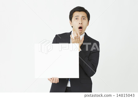 拿著留言簿的一個驚奇的商人 拿著留言簿的一個驚奇的商人 14815043