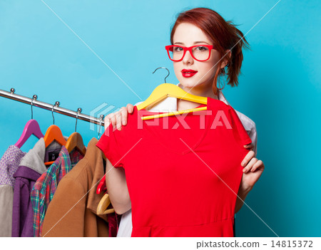 Young redhead designer with dress Young redhead designer with dress 14815372
