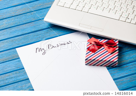 paper with My Business inscription near notebook 14816014