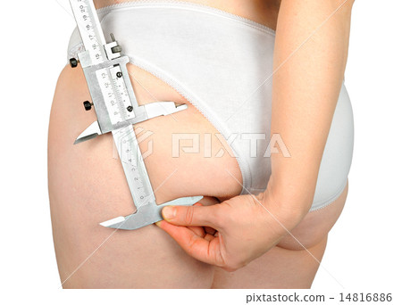 Fat woman measuring fat on the thigh caliper Fat woman measuring fat on the thigh caliper 14816886