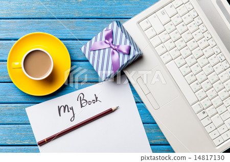 Coffee and paper with My Book inscription near notebook 14817130