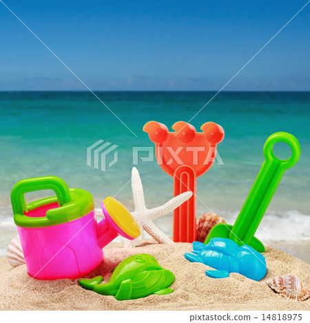 childrens toys in the sand 14818975