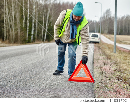 Male and warning triangle Male and warning triangle 14831792