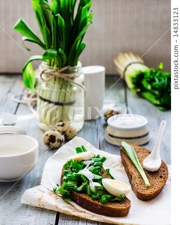 bread with wild garlic, sour cream and quail eggs bread with wild garlic, sour cream and quail eggs 14833123