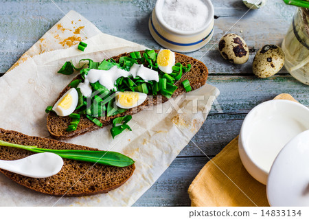 bread with wild garlic, sour cream and quail eggs bread with wild garlic, sour cream and quail eggs 14833134