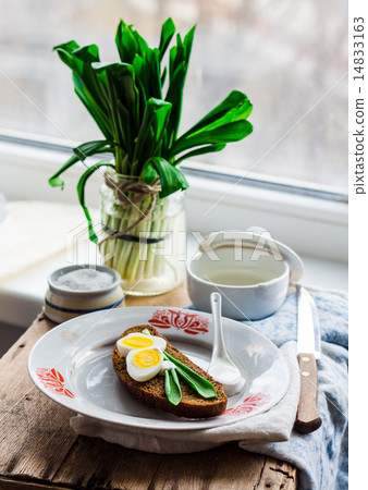 bread with wild garlic, sour cream and quail eggs bread with wild garlic, sour cream and quail eggs 14833163