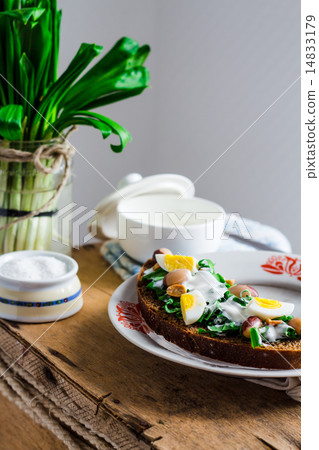 leek with quail eggs and sour cream on rye bread leek with quail eggs and sour cream on rye bread 14833179