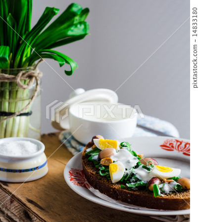 leek with quail eggs and sour cream on rye bread leek with quail eggs and sour cream on rye bread 14833180