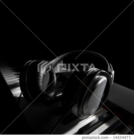 Piano with headphones 14834871